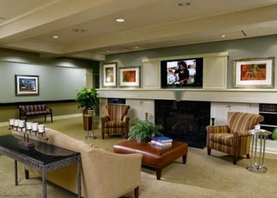 Common area lounge with seating and TV