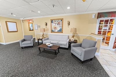 Cozy common area with seating and artwork