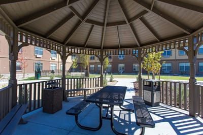 Outdoor gazebo with seating in a senior living community