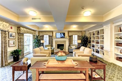 Bright common area with comfortable seating and decor