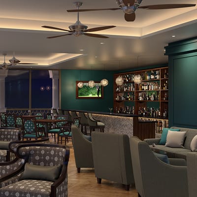 Interior view of a lounge area with seating and a bar
