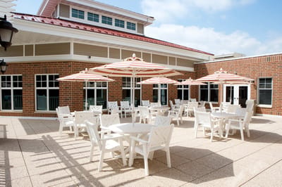 Outdoor seating area with umbrellas and tables