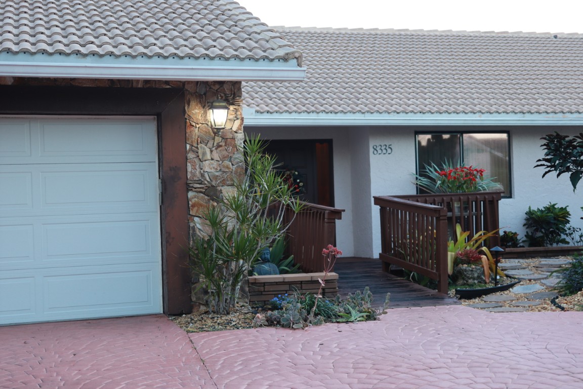 Exterior view of a senior living facility with landscaping