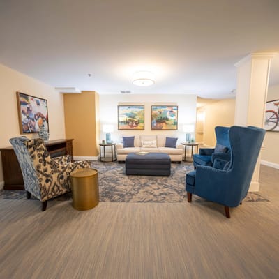 Bright common area with seating and artwork