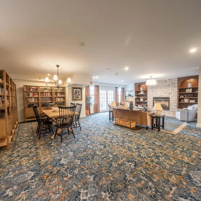 Cozy common area with seating and a fireplace