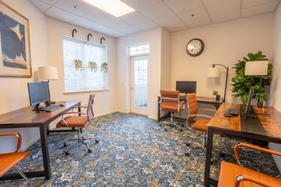 Interior view of a cozy workspace with computers