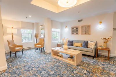 Bright common area with seating and decor