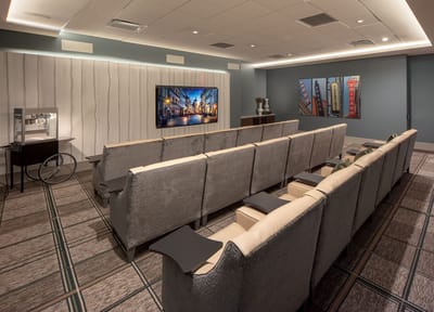 A cozy common area with seating and artwork