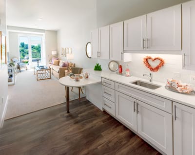 Modern interior view of a resident suite with kitchen area