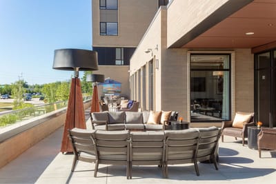 Outdoor seating area with modern furniture at the facility