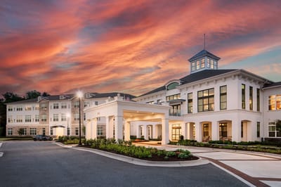 Exterior view of Garden Estates of Temple at sunset