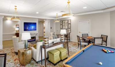 Interior common area with pool table and seating