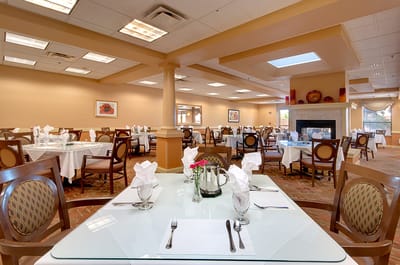 Dining room set with elegant table settings