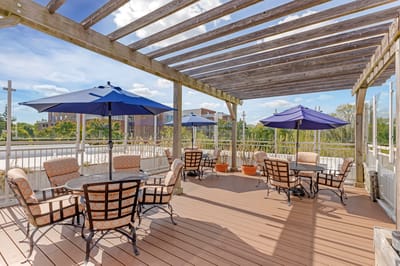 Outdoor terrace with tables and umbrellas