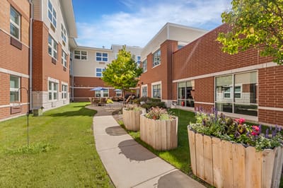 Outdoor courtyard with landscaped garden and seating