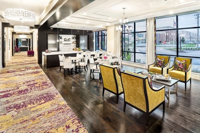 Stylish common area with seating and a dining area