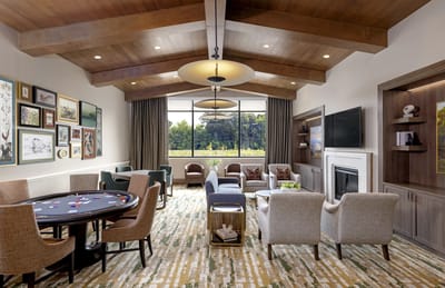 Interior common area with seating and game table