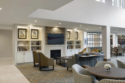 Interior view of a cozy common area with seating