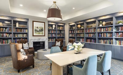 Cozy reading area with shelves and seating
