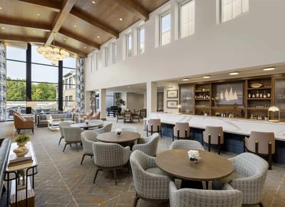 Interior view of a spacious common area with seating
