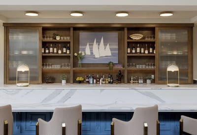 Stylish interior common area with a bar and seating