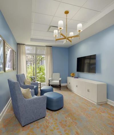 Cozy common area with comfortable seating and TV