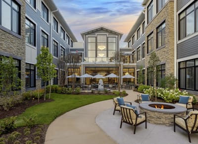 Outdoor garden space with seating and fire pit