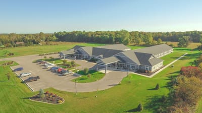 Aerial view of Howell's Care 3 facility with landscaped grounds