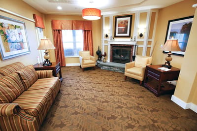 Comfortable lounge area with seating and decorative features