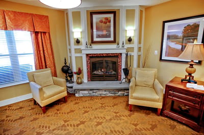 Cozy common area with seating and fireplace