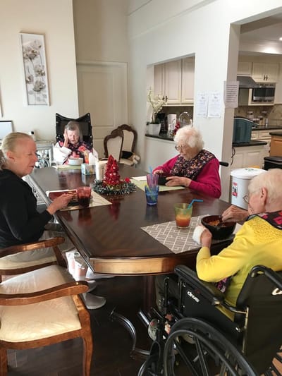 Residents enjoying a meal in a common area