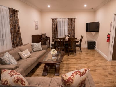 Cozy common area with seating and dining table