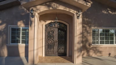 Entrance with decorative door and window