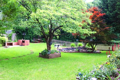 Beautiful landscaped garden with a pond and trees