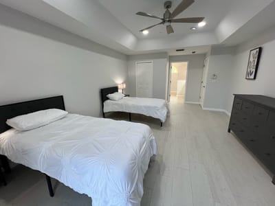 A cozy twin bedroom in a assisted living facility