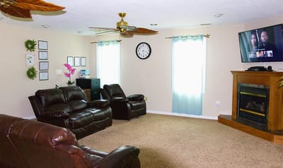Comfortable lounge area with seating and a television