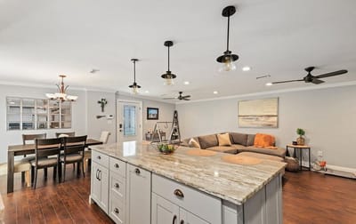 Bright common area with seating and dining space