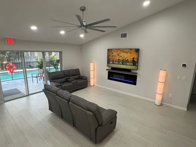 Lounge area with modern seating and pool view