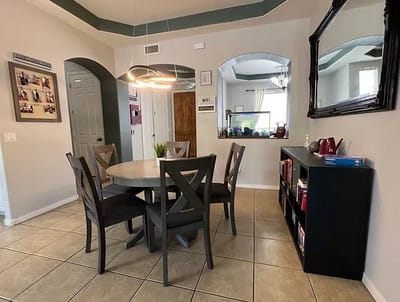 Indoor dining area with a round table and chairs