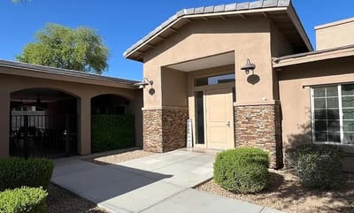 Exterior view of a welcoming assisted living facility entrance
