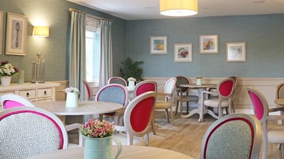 Bright and inviting common area with colorful seating.