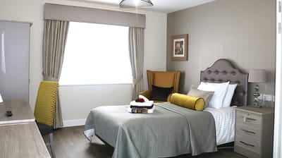Well-furnished resident room with modern decor