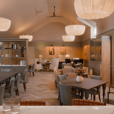 Elegant dining area with stylish decor and furnishings.