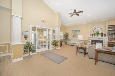 Cozy lobby area with seating and plants