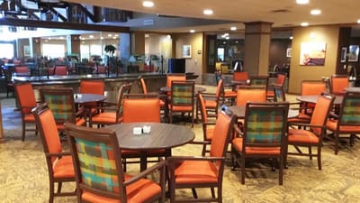 Common area with colorful chairs and tables