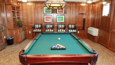 Billiards table in a cozy common area