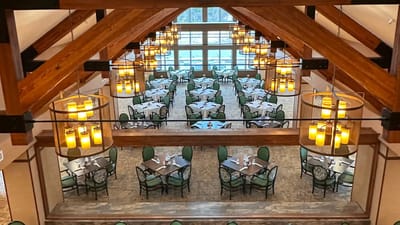 View of a spacious dining room with tables