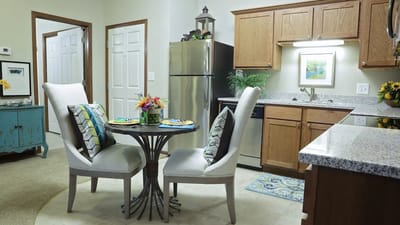 Cozy kitchen and dining area in a resident's unit