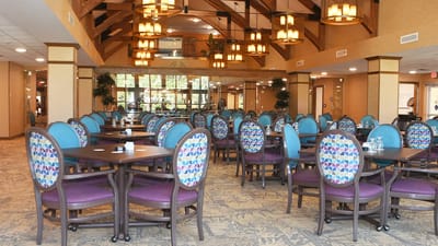 Bright dining area with colorful seating arrangements