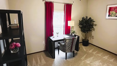 Well-decorated personal space with desk and chair